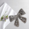 Jaanshu glitter hair bow